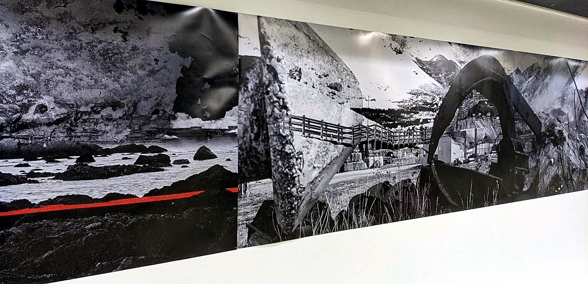 Detail of the panoramic photographic collage behind glass, with snow-covered landscapes and architectural fragments