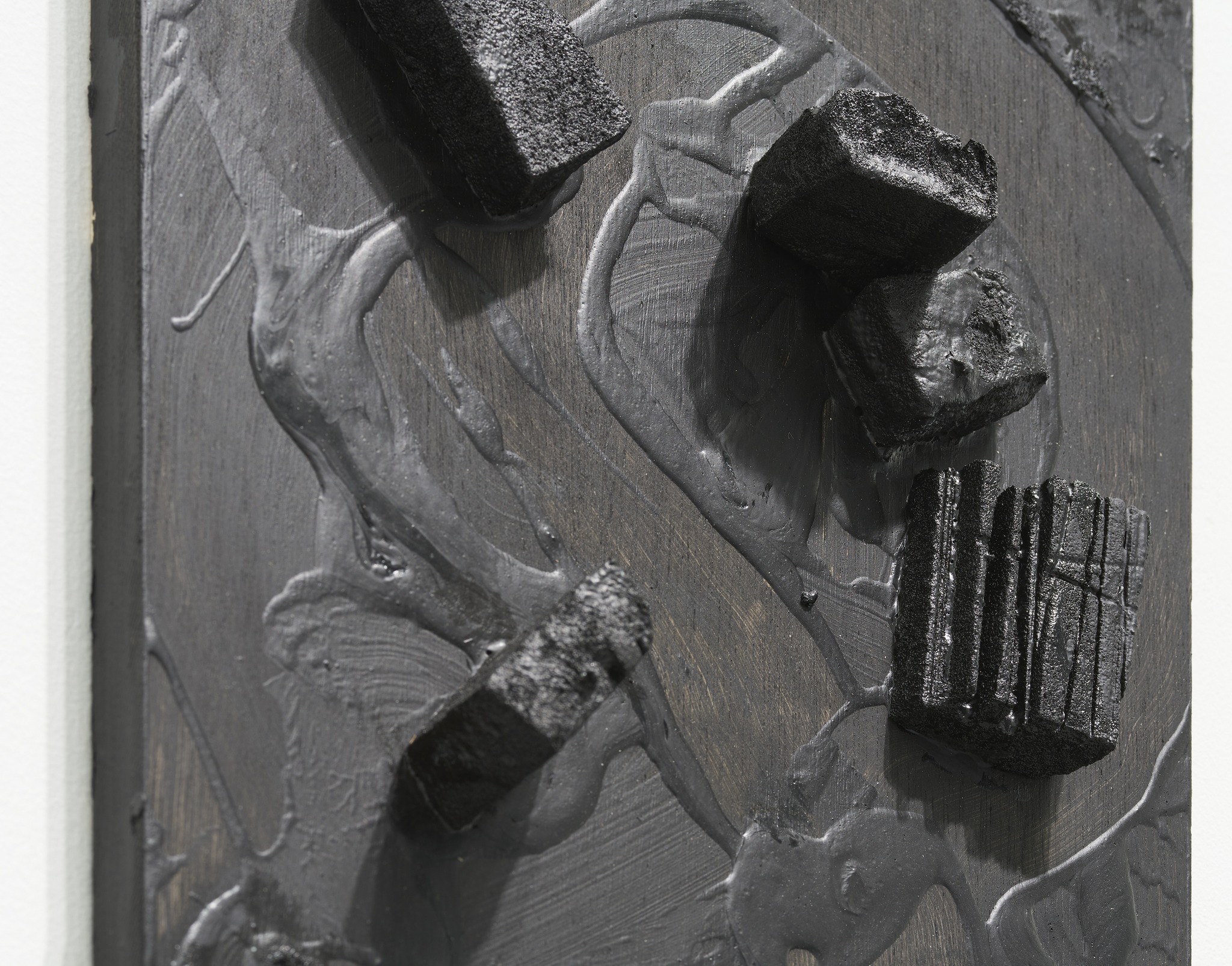 Detail of another painting. Wood blocks set into the painted surface as sunken ships